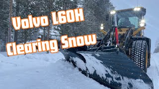 Volvo L60H plowing roads  Moving huge snow piles [upl. by Kamaria]