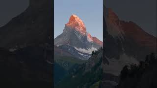 Sunrise on a snow topped mountain mountains sunrise timelapse [upl. by Kiernan]