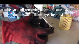 2006 BMW 330I E90 Oil Filter Change [upl. by Hinkle929]