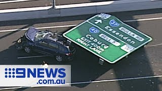 Freeway sign falls crushing car  Nine News Australia [upl. by Avis569]