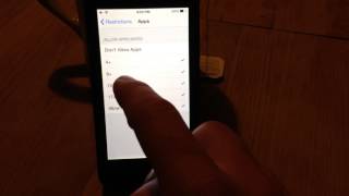 Enable and Disabling Restrictions on an iPhone iOS 7 How to [upl. by Nosrettap677]