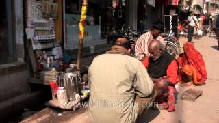 Varanasi roadside dentist working on a denture [upl. by Dailey233]