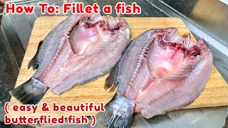 Easy way to fillet your fish amp beautifully effortlessly butterfly a fish  Fillet Sea Bass [upl. by Wachtel]