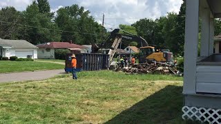 Crews begin cleanup of trash heap near vacant Youngstown home [upl. by Ydieh]