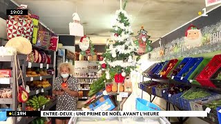 À l’EntreDeux la distribution de Noël a commencé avec un chèque solidaire de 50 € [upl. by Ecnedac75]