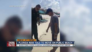 VIDEO Deputies tell man to leave portion of public beach for trespassing following new beach law [upl. by Euqitsym]