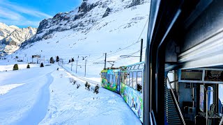 Riding a train in the Swiss Alps in winter ❄️ Grindelwald 4K 🇨🇭 [upl. by Oikim]