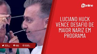 Luciano Huck tem nariz medido ao vivo no Domingão e vence desafio [upl. by Ylrrad]