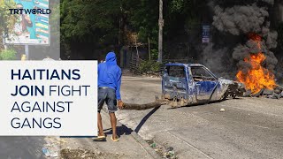 Haitians join police to fight off gang attacks in capital [upl. by Ocirne]