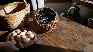 Indigo stalk nest basket with ceramic eggs in a bed of dried indigo leaves [upl. by Naicul]