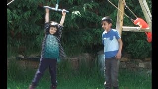 Kids Playing on a Spinning Twizzler Hanging from Swing Frame [upl. by Halstead348]