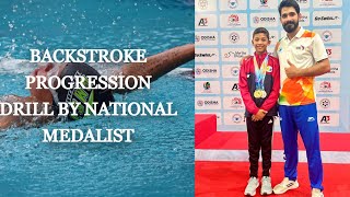 Backstroke Drill Progressions  Improve Your Technique  Krishiv Doshi [upl. by Zink725]