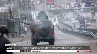 Police clash with demonstrators in Maputo Mozambique [upl. by Einiffit208]