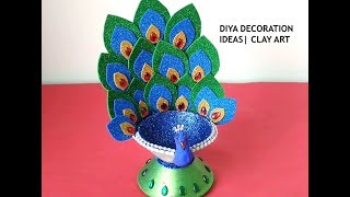 Diwali Diya decoration Ideas  Peacock diya  Clay Art [upl. by Tufts]