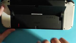 How to Take microSD Card Out of Nintendo Switch  Remove microSD Card [upl. by Hilde]