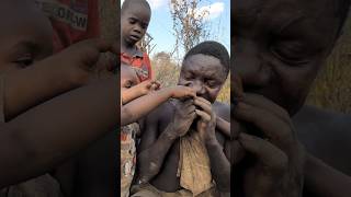 Hadza man feeding his children a favorite Soup middle of nowhere 😄‼️😋food hadzabetribe [upl. by Nah]