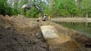 Excavator digging pond [upl. by Francis205]