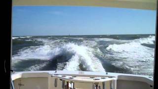 surfing a 53 carolia through hatteras inlet [upl. by Akilegna]