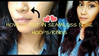 HOW TO PUT IN SEAMLESS NOSE HOOPRINGS [upl. by Imalda]