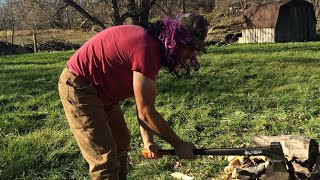 Splitting firewood by using a splitting maul [upl. by Cumine399]