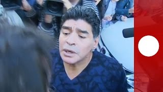 Video Diego Maradona slaps reporter for winking at exwife [upl. by Anneiv]