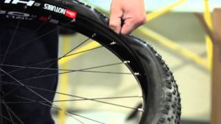 Howto Installing Tires on the Hugo 52 Rims  Stans NoTubes [upl. by Nahshon499]