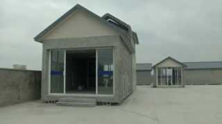 Chinese company uses 3D printer to build homes [upl. by Barna]