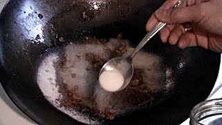 How To Clean And Restore A Burnt Wok Seasoning A Carbon Steel Wok How To Make A Wok NonStick [upl. by Aidyl12]