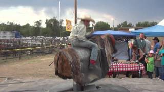 Young Bull Rider JC Mortensen on mechanical bull at Prescott rodeo [upl. by Ardnad203]