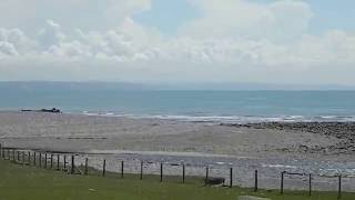 Panorama of Tonfannau beach old Army camp remains amp Llyn peninsula Tywyn Gwynedd Cymru Wales [upl. by Ijan]