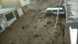 Watch Deadly mudslides overtake streets in Peru [upl. by Bruns]