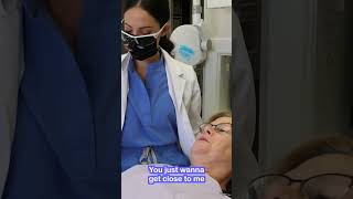 dental hygienist slouching while cleaning her coworkers teeth shorts [upl. by Niobe]