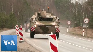 Hundreds of German Soldiers Military Vehicles Arrive at Lithuanian NATO Base [upl. by Irmina]