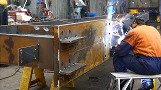 Fabrication process of steel building frame and the fully automatic steel frame welding line [upl. by Notneiuq]