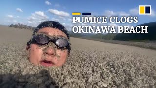 Pumice stone accumulation on Okinawa beach ‘disastrous’ for village [upl. by Notyard899]