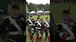 Atholl Pipe Band lead Highlanders salute to Chieftain during 2022 Atholl Highland Games shorts [upl. by Inhsor224]