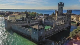 DRONE CASTELLO SCALIGERO DI SIRMIONE SUL LAGO DI GARDA  4K by Yuri Grisendi [upl. by Imef456]