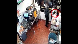 CAUGHT ON TAPE Restaurant worker snacking and pocketing cash [upl. by Enotna]