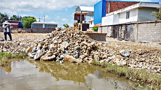 Wonderful New Project Bulldozer KOMATSU D31P Pushing stone into water with 5ton Trucks [upl. by Robert]