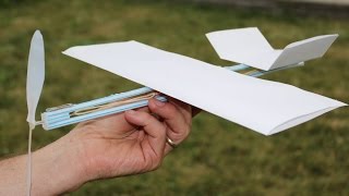 How to Make a Rubber Band Plane Out of Paper  Very EASY [upl. by Dnomyad]