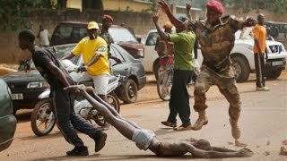 Graphic Footage Central African Republic POLICE SLAPPING and Searching a CITIZEN [upl. by Vasily221]