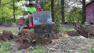 Digging Up Stumps With The Harbor Freight Central Machinery Backhoe Volume One [upl. by Nrublim514]