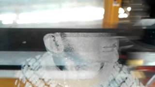 Laser engraving of a photo on glass a glass mirror [upl. by Enytsirk]