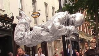 Silver man secret revealed London street performer floating and levitating trick [upl. by Inobe]