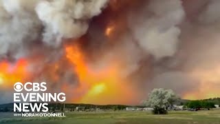 Fastspreading wildfires force evacuation of New Mexico town [upl. by Mihsah]