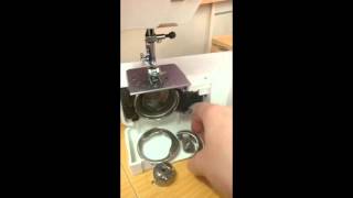 How to pull apart and reassemble the bobbin case area on a front loading sewing machine [upl. by Barbara]