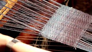 Weaving a scarf on a loom [upl. by Kass]