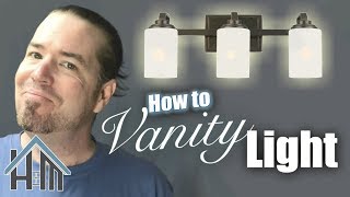 How to install vanity light bath light Easy Home Mender [upl. by Yennek914]