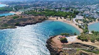 Agioi Apostoloi Beach in Chania Crete  4K Aerial Video by Unique Productions [upl. by Tybald]