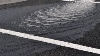 Porous Asphalt Demonstration [upl. by Leahciam732]